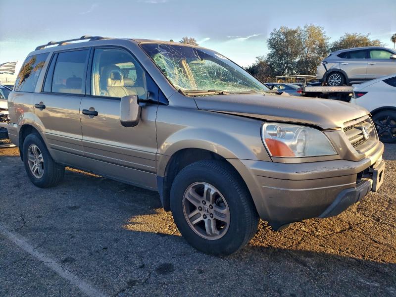 Photo 4 from auction – 2004 HONDA PILOT with VIN 2HKYF18594H612410