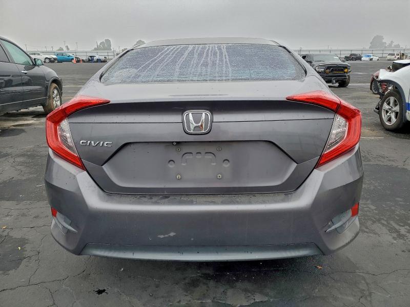 Photo 6 from auction – 2016 HONDA CIVIC LX with VIN 19XFC2F50GE208364