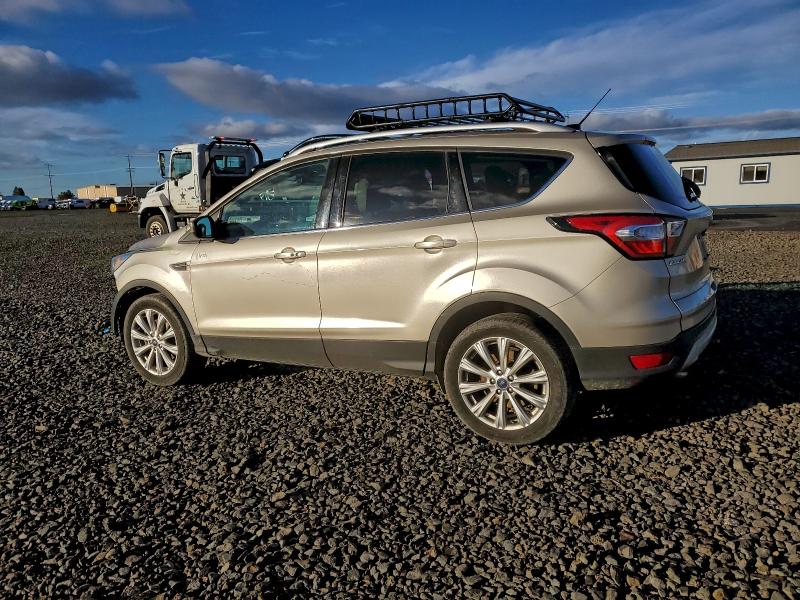 Photo 2 from auction – 2017 FORD ESCAPE with VIN 1FMCU9J95HUC14159
