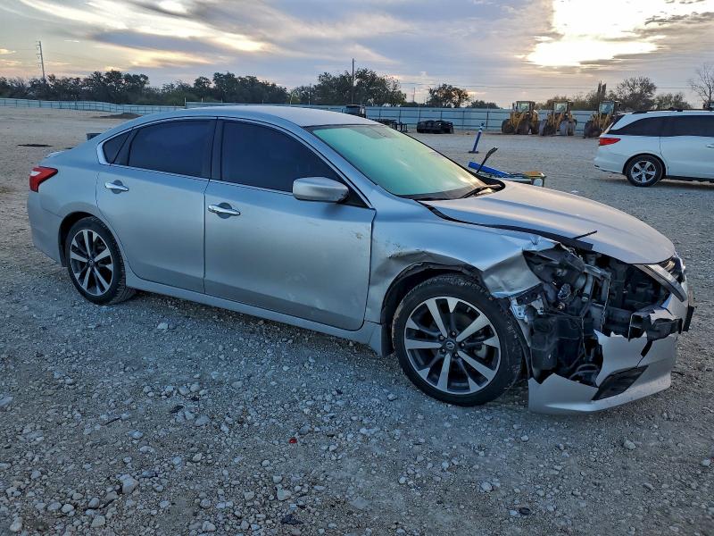 Photo 4 from auction – 2016 NISSAN ALTIMA 2.5 with VIN 1N4AL3AP4GC128412