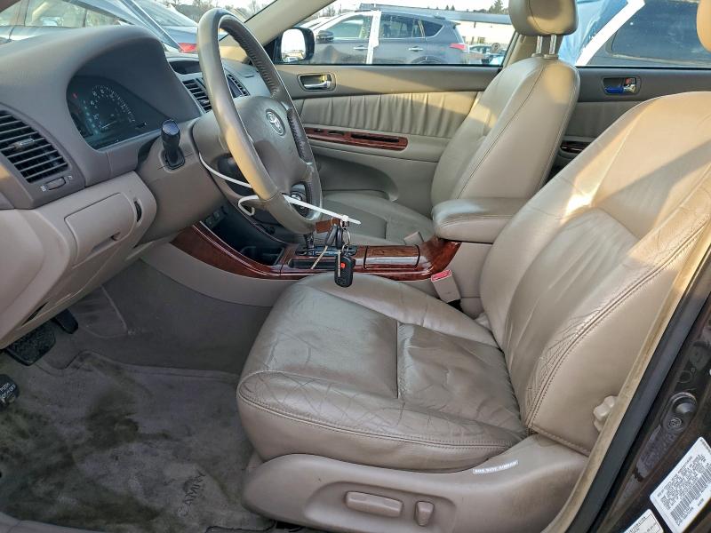Photo 7 from auction – 2002 TOYOTA CAMRY LE with VIN 4T1BF30KX2U510289