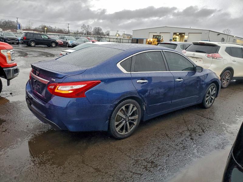 Photo 3 from auction – 2016 NISSAN ALTIMA 2.5 with VIN 1N4AL3AP8GC128543