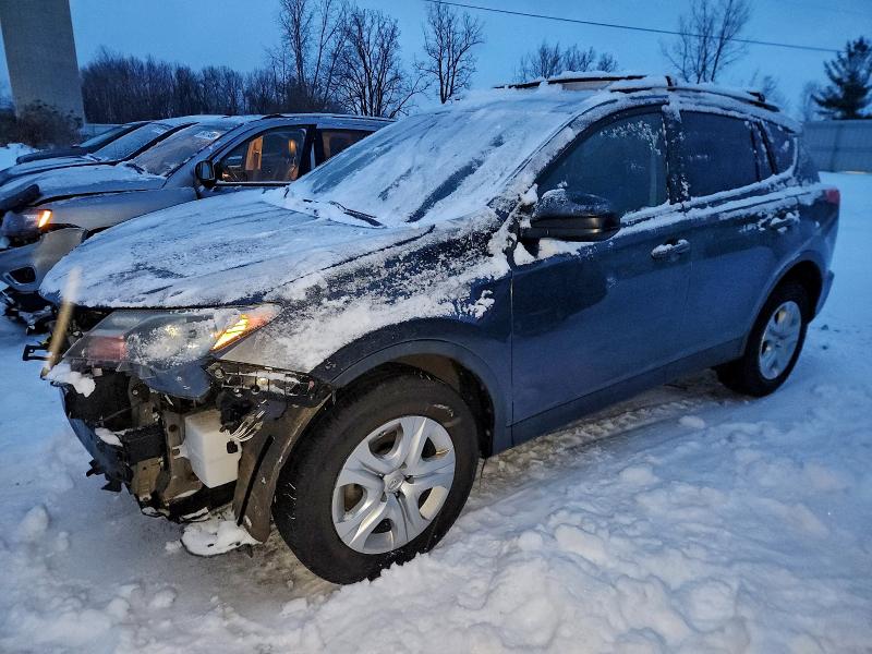 TOYOTA RAV4 LE 2014 with VIN JTMBFREV0ED047321 - Photo from auction