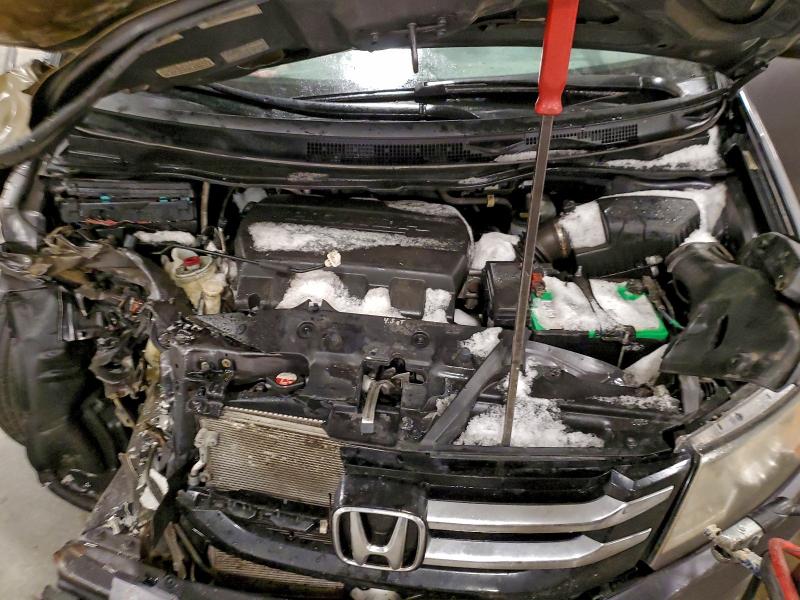Photo 12 from auction – 2014 HONDA ODYSSEY EX with VIN 5FNRL5H69EB078659