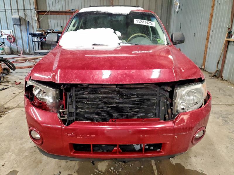 Photo 5 from auction – 2011 FORD ESCAPE with VIN 1FMCU9D76BKA67119