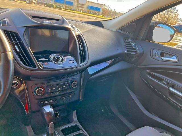 Photo 9 from auction – 2017 FORD ESCAPE TIT with VIN 1FMCU0J97HUD29051