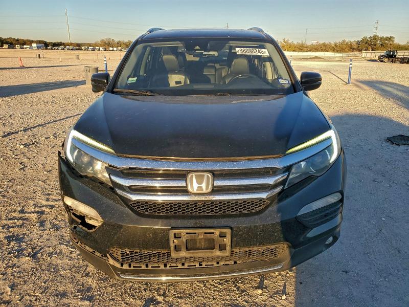 Photo 5 from auction – 2017 HONDA PILOT TOUR with VIN 5FNYF6H9XHB085885