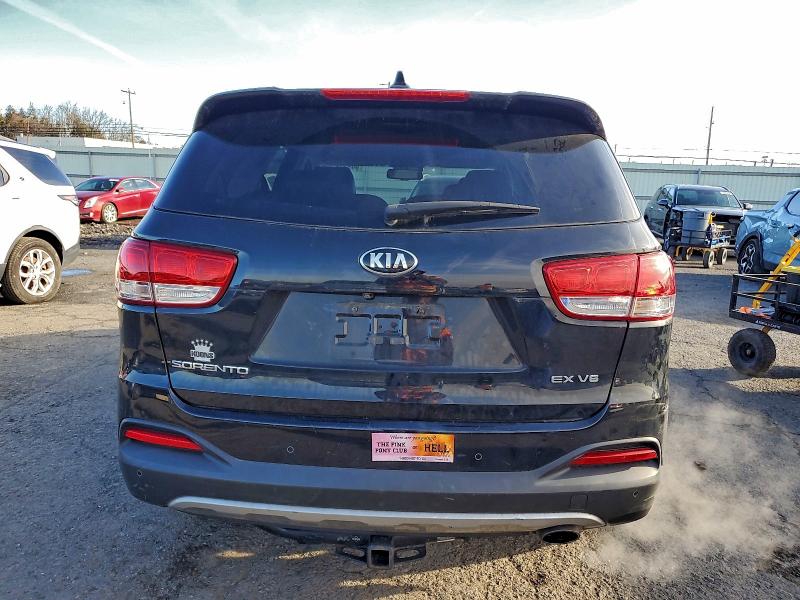 Photo 6 from auction – 2016 KIA SORENTO EX with VIN 5XYPH4A52GG003558