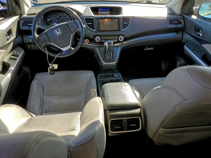 Photo 8 from auction – 2015 HONDA CR-V EXL with VIN 2HKRM3H72FH547846