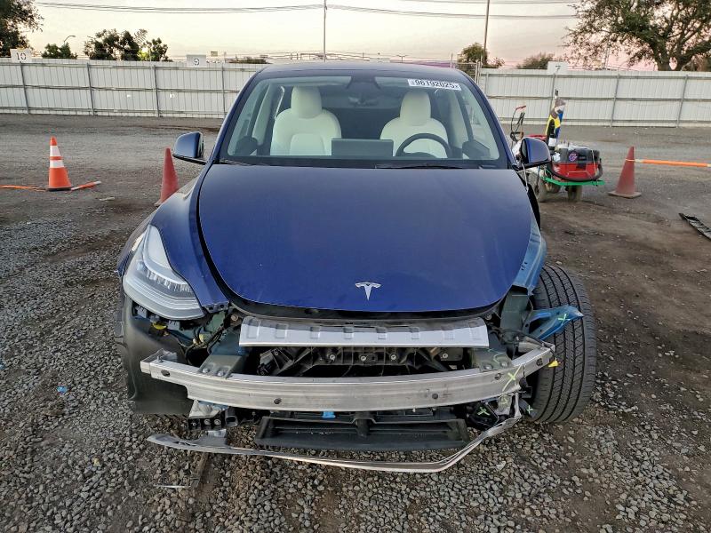 Photo 5 from auction – 2022 TESLA MODEL Y with VIN 7SAYGAEE7NF507174