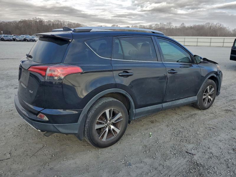 Photo 3 from auction – 2016 TOYOTA RAV4 XLE with VIN 2T3WFREVXGW265743