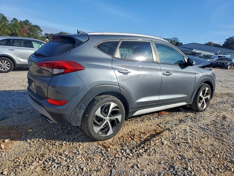 Photo 3 from auction – 2017 HYUNDAI TUCSON LIM with VIN KM8J33A23HU474909
