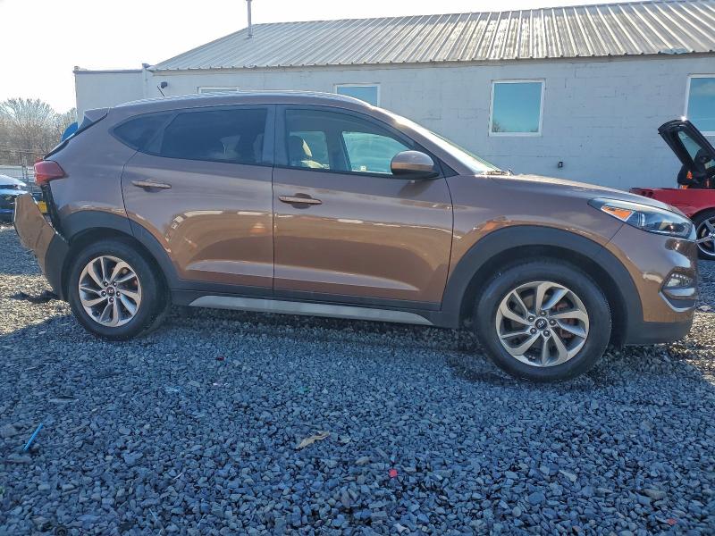 Photo 4 from auction – 2017 HYUNDAI TUCSON LIM with VIN KM8J3CA47HU497319