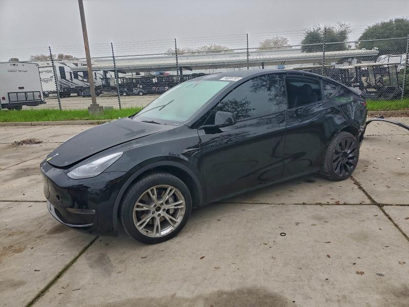 TESLA MODEL Y 2023 with VIN 7SAYGAEE5PF621564 - Photo from auction