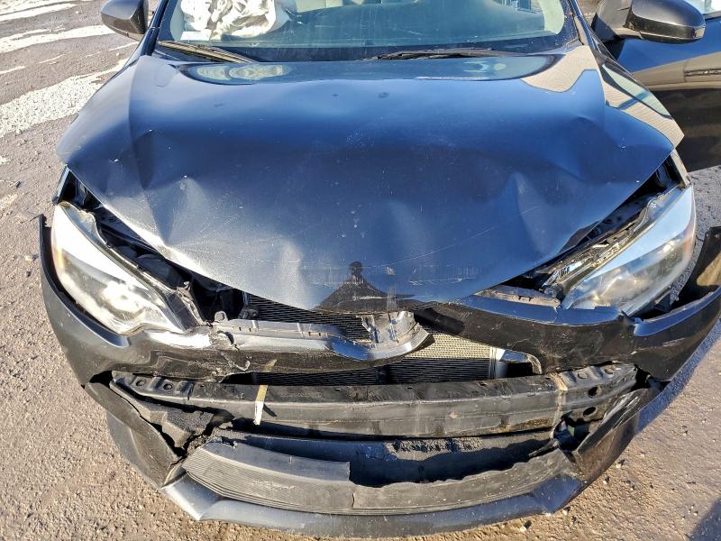 Photo 11 from auction – 2014 TOYOTA COROLLA L with VIN 2T1BURHE5EC110993
