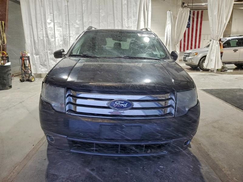 Photo 5 from auction – 2008 FORD TAURUS X S with VIN 1FMDK02W18GA03453