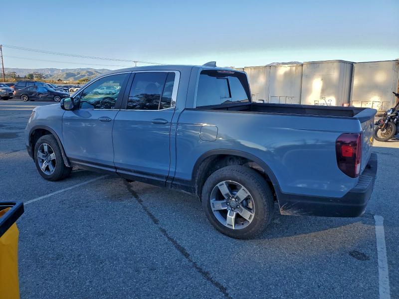 Photo 2 from auction – 2025 HONDA RIDGELINE with VIN 5FPYK3F58SB019540