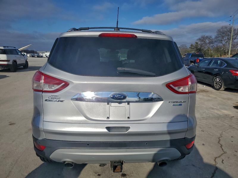 Photo 6 from auction – 2014 FORD ESCAPE TIT with VIN 1FMCU9J95EUB03784