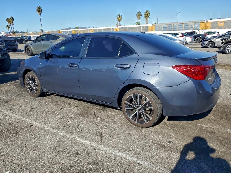 Photo 2 from auction – 2017 TOYOTA COROLLA L with VIN 5YFBURHE1HP689534