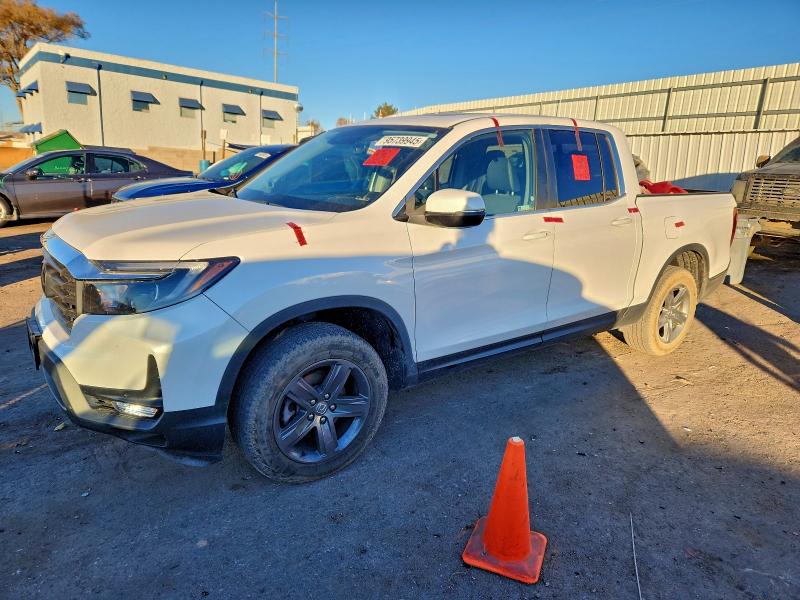 HONDA RIDGELINE 2023 with VIN 5FPYK3F50PB011875 - Photo from auction