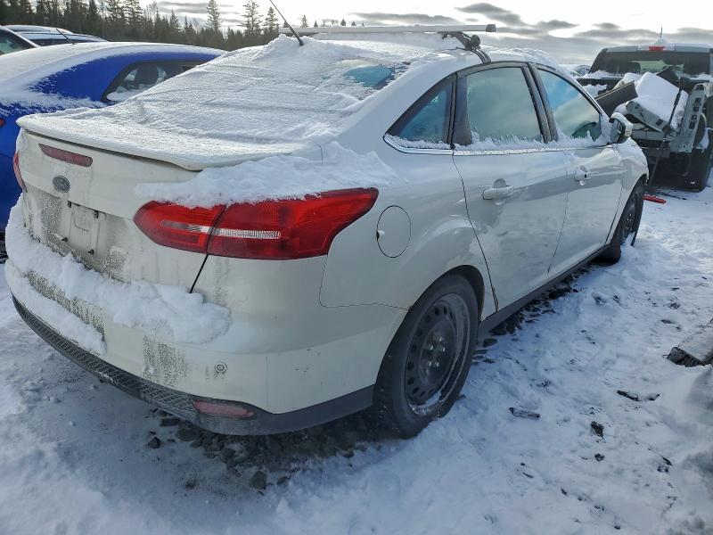 Photo 3 from auction – 2016 FORD FOCUS TITA with VIN 1FADP3J24GL303652