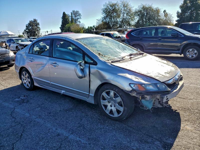 Photo 4 from auction – 2011 HONDA CIVIC LX with VIN 19XFA1F50BE049841