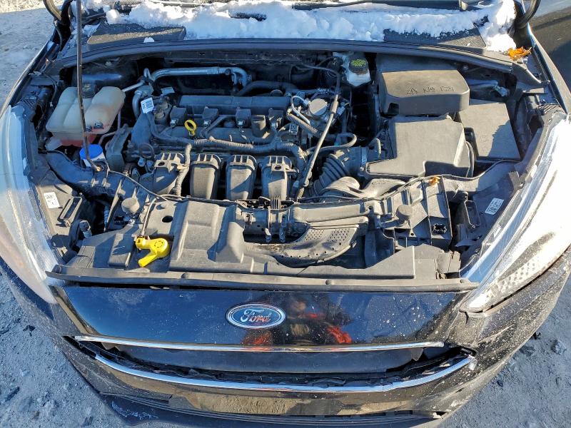 Photo 11 from auction – 2017 FORD FOCUS with VIN 1FADP3F24HL325807