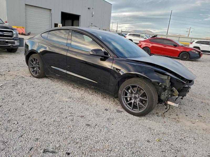 Photo 4 from auction – 2022 TESLA MODEL 3 with VIN 5YJ3E1EB0NF349747