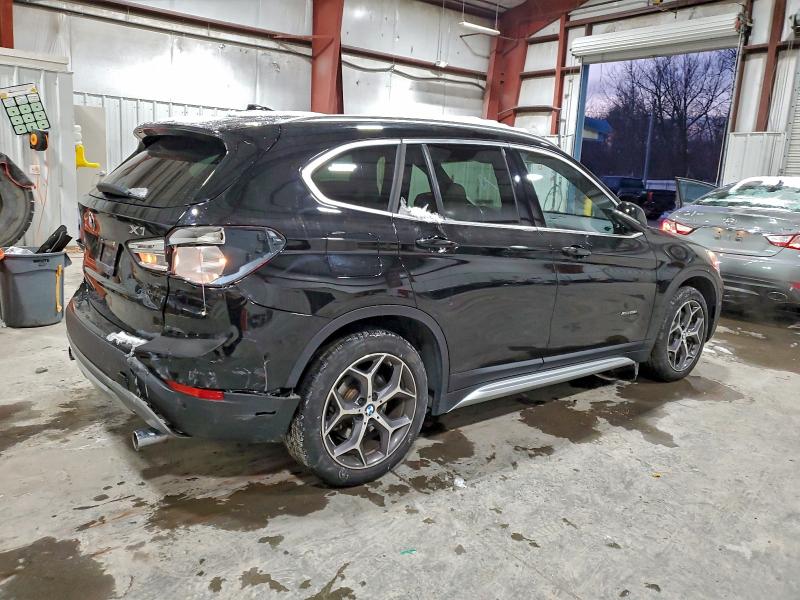 Photo 3 from auction – 2018 BMW X1 XDRIVE2 with VIN WBXHT3C3XJ5K26345