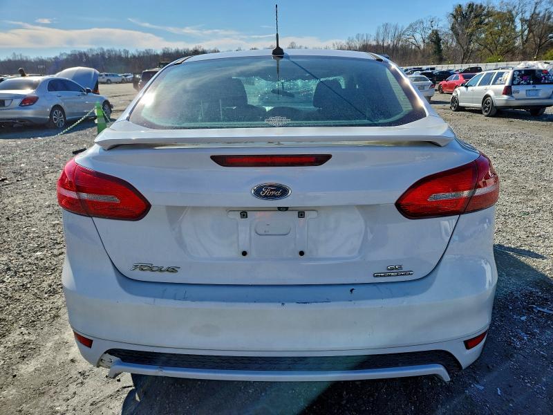 Photo 6 from auction – 2015 FORD FOCUS SE with VIN 1FADP3F29FL311124