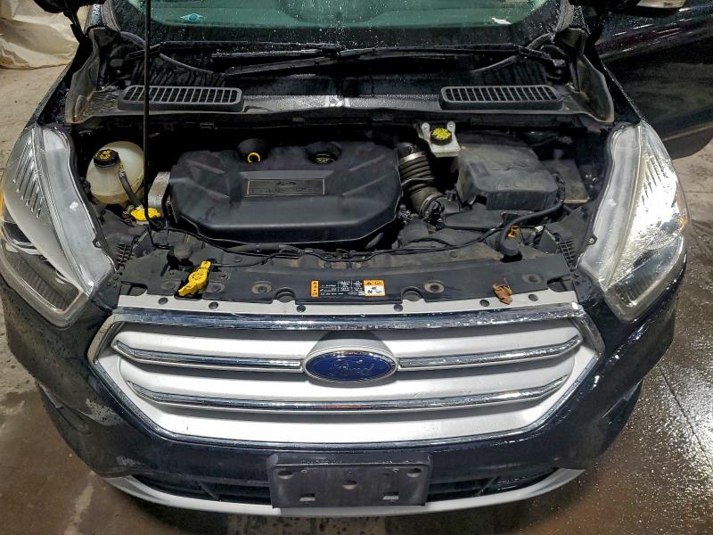 Photo 12 from auction – 2018 FORD ESCAPE TIT with VIN 1FMCU9J98JUA31134