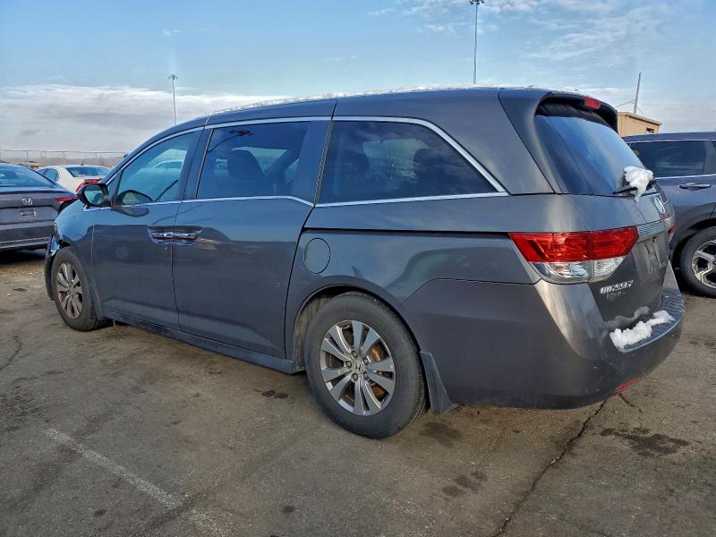 Photo 2 from auction – 2014 HONDA ODYSSEY with VIN 5FNRL5H60EB095673