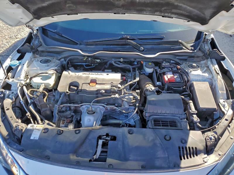 Photo 11 from auction – 2018 HONDA CIVIC EX with VIN 19XFC2F74JE023629