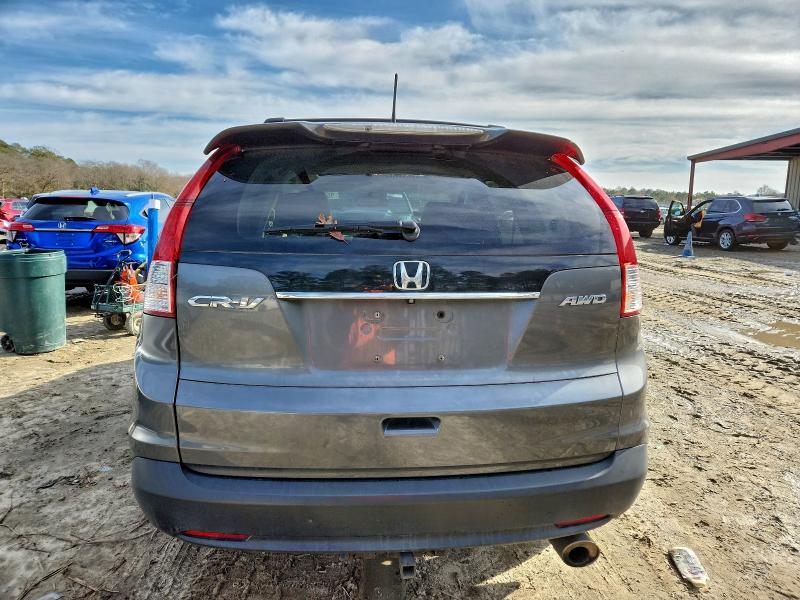 Photo 6 from auction – 2014 HONDA CRV with VIN 5J6RM4H71EL077528