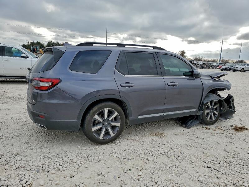 Photo 3 from auction – 2023 HONDA PILOT with VIN 5FNYG2H71PB009197