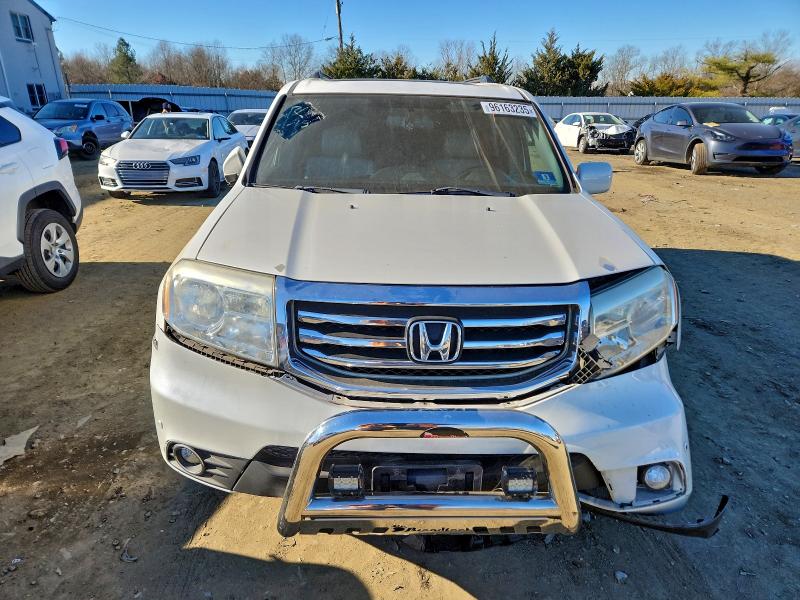 Photo 5 from auction – 2013 HONDA PILOT TOUR with VIN 5FNYF4H90DB077812