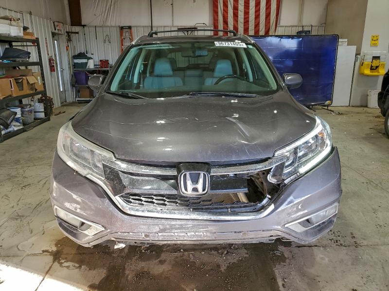 Photo 5 from auction – 2015 HONDA CR-V with VIN 2HKRM4H77FH664182