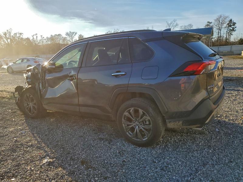Photo 2 from auction – 2022 TOYOTA RAV4 LIMIT with VIN JTMD6RFV8ND520809