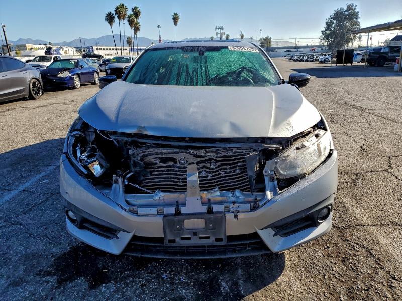 Photo 5 from auction – 2017 HONDA CIVIC EX with VIN 2HGFC1F37HH644337