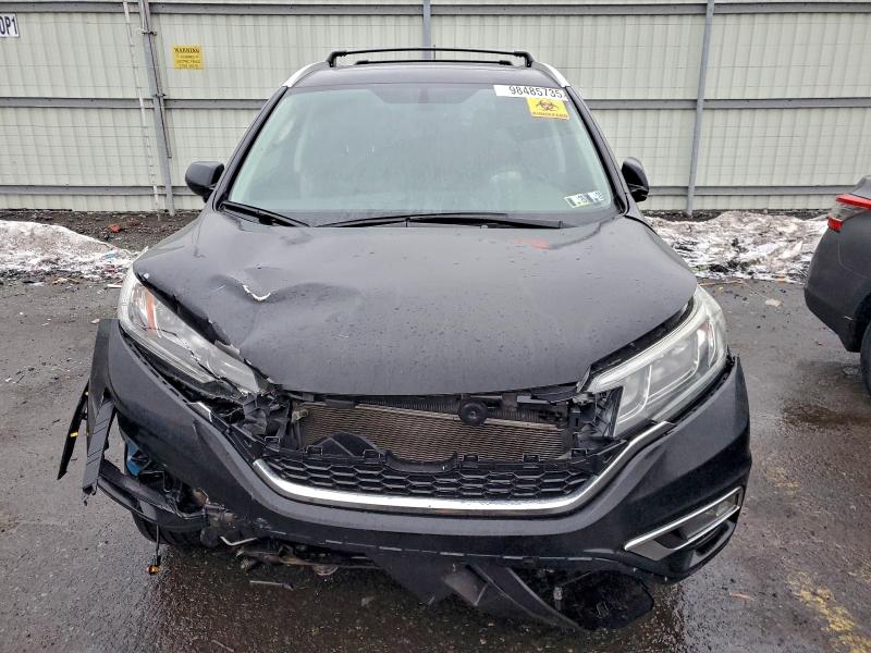 Photo 5 from auction – 2016 HONDA CR-V EXL with VIN 2HKRM4H77GH686877