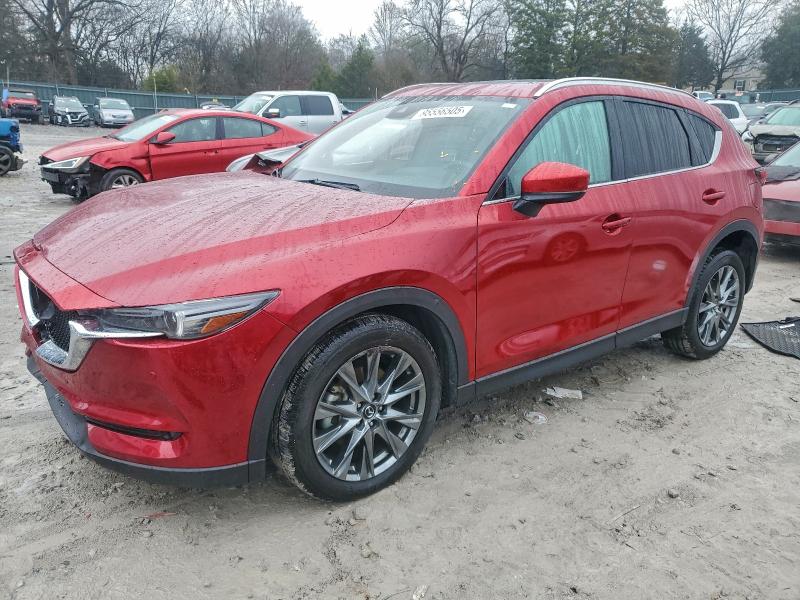 MAZDA CX-5 SIGNA 2021 with VIN JM3KFBEY0M0432439 - Photo from auction