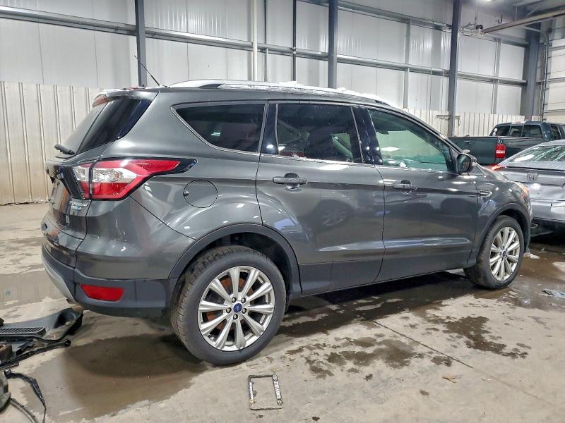 Photo 3 from auction – 2017 FORD ESCAPE TIT with VIN 1FMCU9JD5HUB57885
