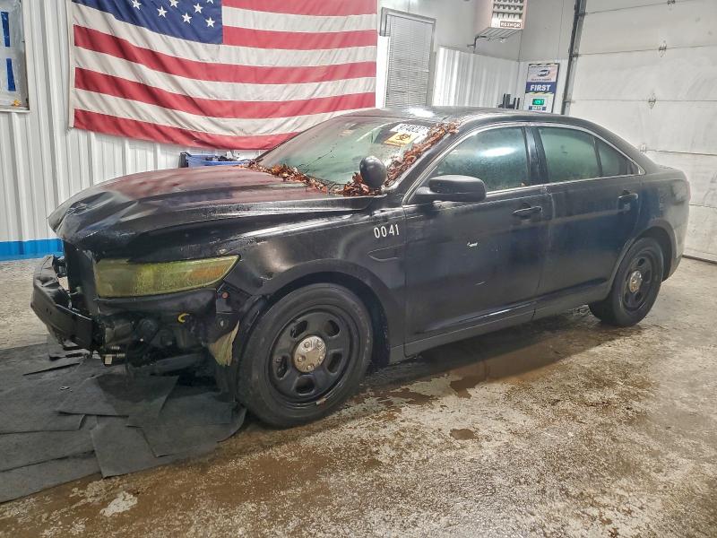FORD TAURUS POL 2014 with VIN 1FAHP2MK2EG127777 - Photo from auction