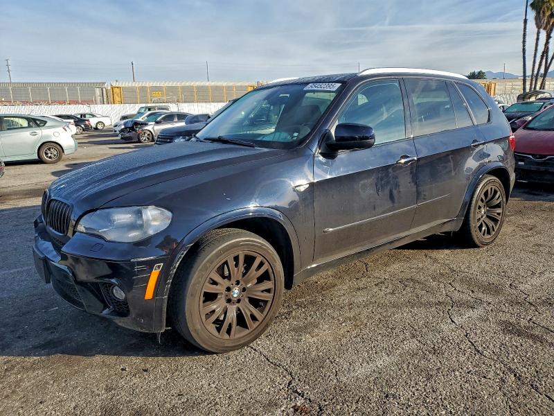 BMW X5 XDRIVE5 2013 with VIN 5UXZV8C58D0C15082 - Photo from auction