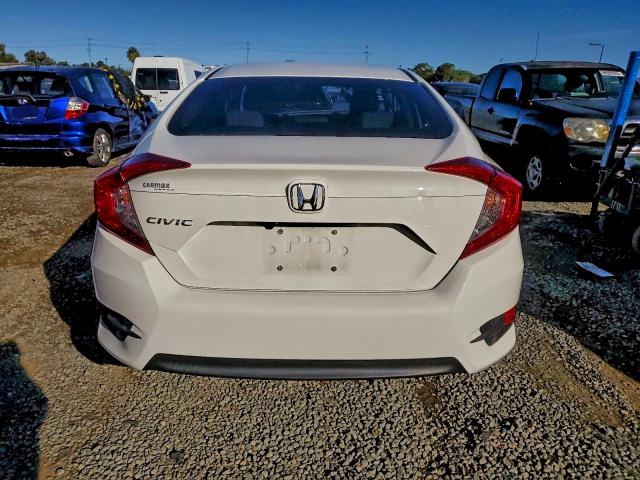Photo 6 from auction – 2017 HONDA CIVIC LX with VIN 2HGFC2F50HH548704