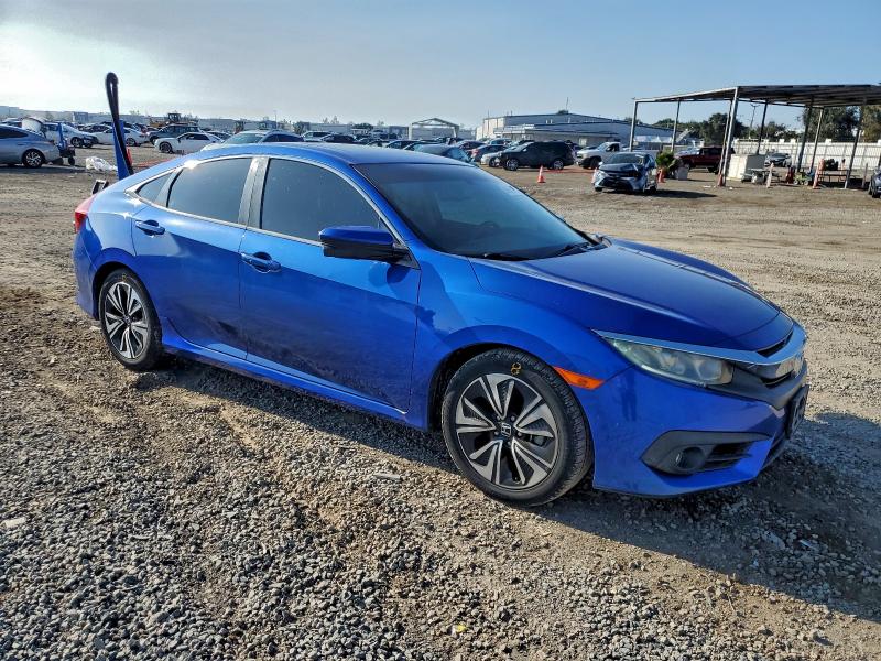 Photo 4 from auction – 2016 HONDA CIVIC EXL with VIN 19XFC1F70GE204259