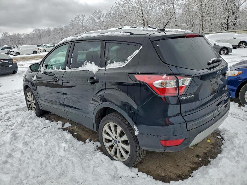 Photo 2 from auction – 2017 FORD ESCAPE with VIN 1FMCU9JD8HUE57033
