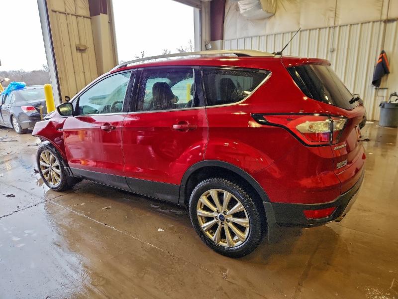Photo 2 from auction – 2017 FORD ESCAPE TIT with VIN 1FMCU9J99HUD25572