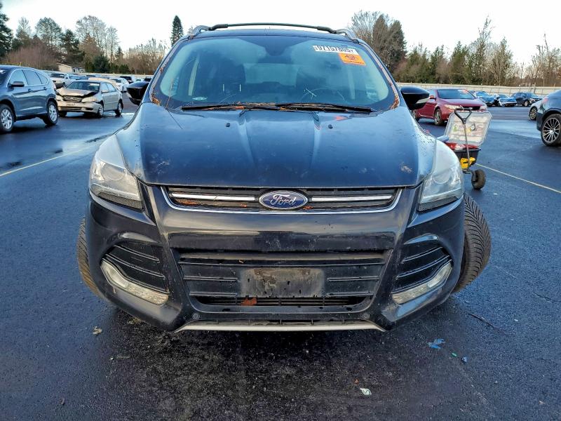 Photo 5 from auction – 2016 FORD ESCAPE TIT with VIN 1FMCU9J99GUC44702