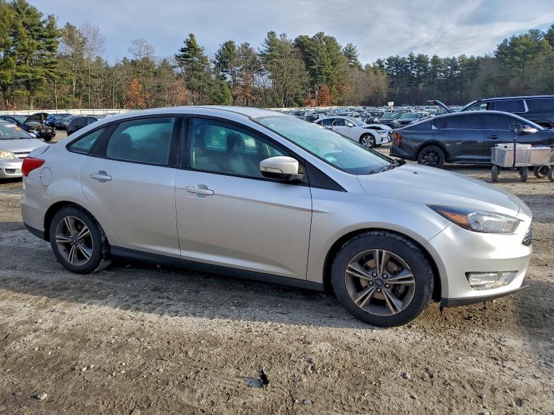 Photo 4 from auction – 2017 FORD FOCUS SE with VIN 1FADP3FEXHL321528